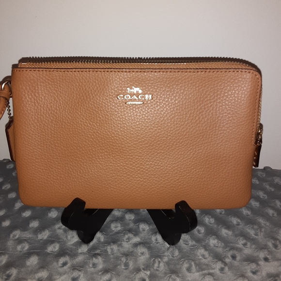 Coach Handbags - Lovely Cognac Coach Wristlet